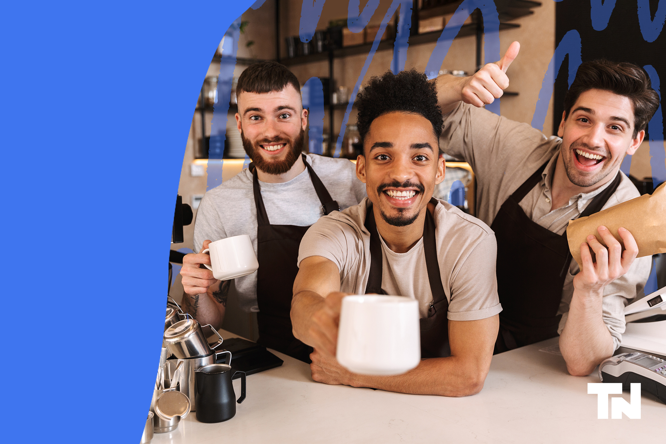 Three young men are happy to be working in a positive experience working in their coffee shop. Their manager has establish a sense of community.