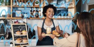 Female coffee shop owner smiling about Small Restaurant Marketing Ideas